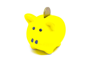 Yellow piggy Bank with Russian ruble on white background