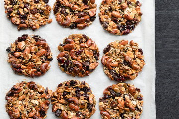 The process of making homemade cereal cookies, Is an easy-to-make food for health lovers,Cashew,Almonds,raisin,Cranberry,honey,egg white,Sunflower Pumpkin Watermelon Seeds,Black & White Sesame