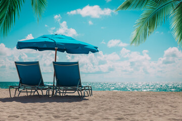Two beach chairs on tropical vacation, relax at sea