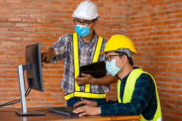Engineer group and builders having wearing protective masks to prevent dust and covid 19 disease...