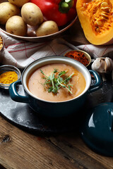 Potatoes, bell pepper, pumpkin, tomatoes, garlic, peas, turmeric, smoked paprika and chili flakes mashed soup