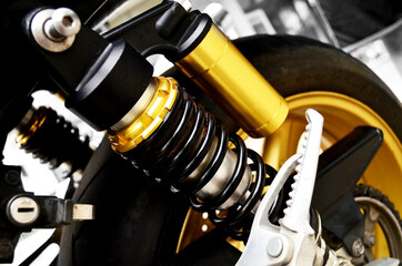 Fototapeta na wymiar Close Up of Motorcycle Super bike Shock Absorber and Spring