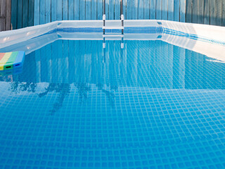 latest modern model of frame pool for children and adults in country house on flat concrete plot on...