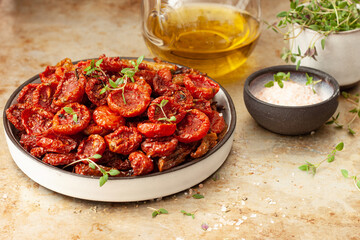 Sun-dried cherry tomatoes with olive oil and herbs.