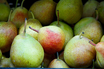 Green pears in the grocery shop stock