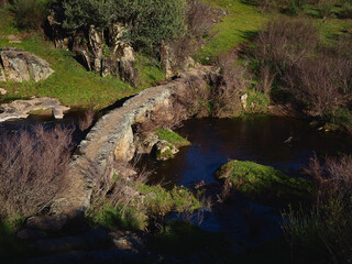 Old granite stone walkway bridge