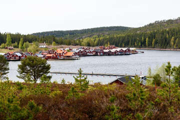 Fototapeta na wymiar View over the little fishing harbor Norrfallsviken High Coast Area Northern Sweden.