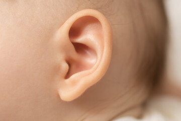 Closeup of baby's ear. 