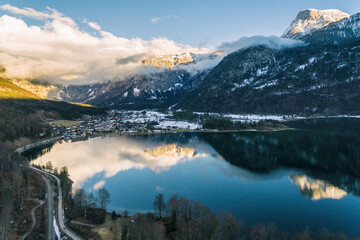 Fototapeta premium Aerial drone photo of Obertraun Lake Hallstatt in Salzkammergut, Austria in Winter