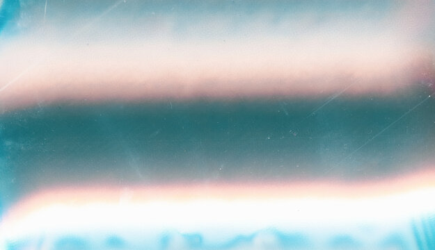 Dust scratches overlay. Weathered texture. Teal blue peach pink color gradient lens flare effect.