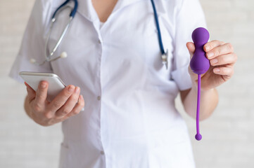 Unrecognized gynecologist recommends a kegel simulator to maintain women's health. The doctor...