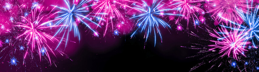 FIREWORK background banner panorama - Colorful pink blue festive firework in summer party /...