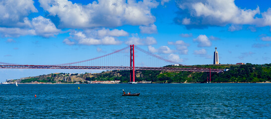 It's Bridge 25 of April in Lisbon, Portugal. It was inaugurated on August 6, 1966
