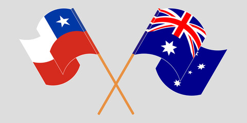 Crossed and waving flags of Chile and Australia