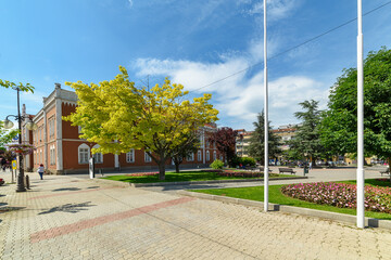 Vrsac, Serbia - June 04, 2020: Municipal building of Vrsac (Serbian: zgrada opstine Vrsac). Town Hall and park in freedom Square's