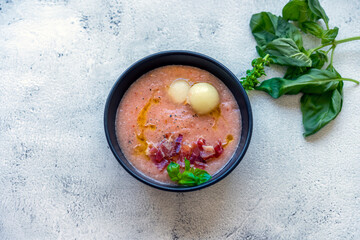 Melon soup with iberian ham. Melon gazpacho.