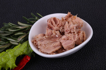 Tasty canned tuna fish in the bowl