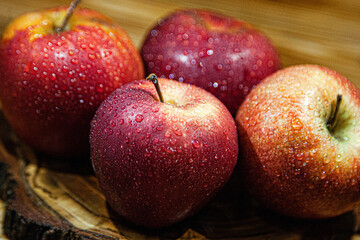 Red juicy apples with water drops on them
