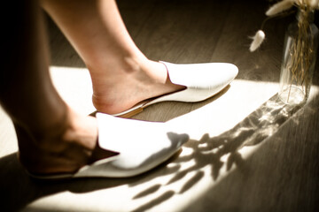 women's shoes on legs, fashionable style, beige color, mirror, instagram trends, at home or indoors, casual style