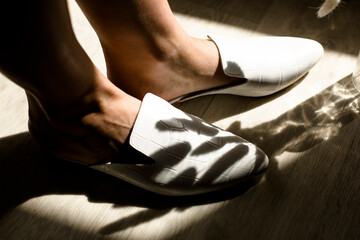 women's shoes on legs, fashionable style, beige color, mirror, instagram trends, at home or...