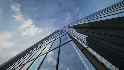 Fototapeta na wymiar 3D Rendering Of Modern Office Building With Blue Sky Visualization
