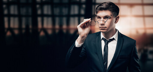 Portrait of a businessman at the airport. He is very unhappy with the flight delay, so nervously...