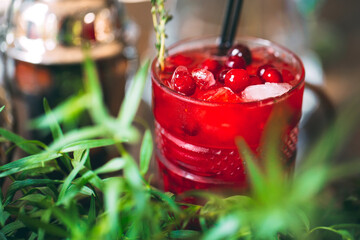 Berry cocktail on the tray. close-up of a cold cocktail.
