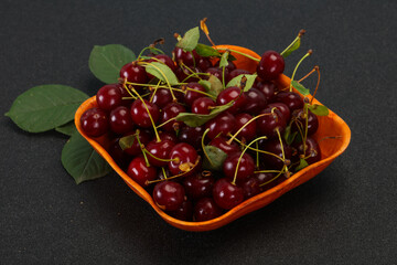 Sweet ripe cherry with leaves