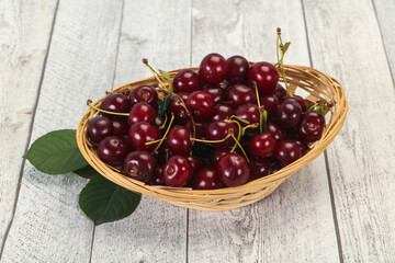 Sweet ripe cherry with leaves