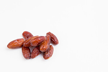 Dried dates (isolated on white background). Copy space. View from above