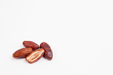 Dried dates (isolated on white background). Copy space. View from above