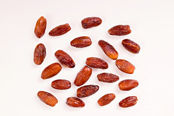 Dried dates (isolated on white background). Copy space. View from above