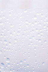 drops of pod on frosted glass
