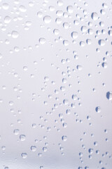 drops of pod on frosted glass