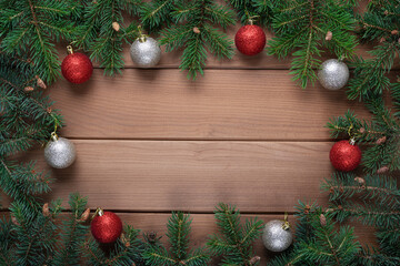 Fototapeta na wymiar Christmas decoration on wood background. Copy space. Winter holidays, New Year.