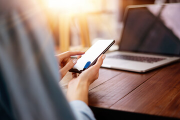 Woman pointing on smartphone screen, chatting in social networks, meeting website, searching...