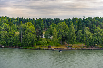 House among the trees in Finland small islands near Turcu