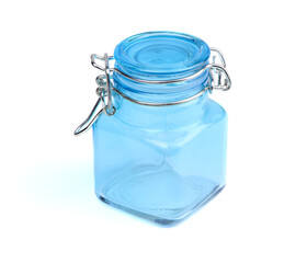 Empty glass spice jar. Blue jar for spice isolated on a white background. Cooking utensil. Kitchen ware. Kitchen utensils.