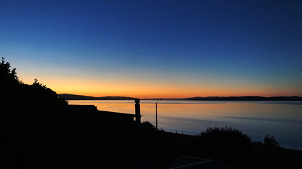 Sunset near the sea in Ancud, Chile