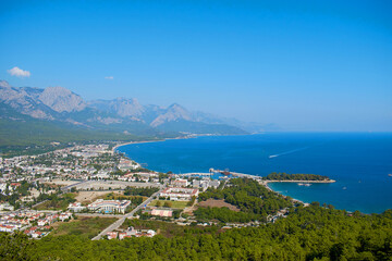 Landscape with city, sea and mountain views. Landscape on the city of Kemer, Turkey, top view.