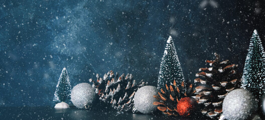 Christmas holiday decoration background with bottle brush trees and snow, copy space for text.
