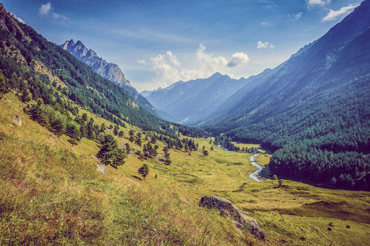 Picturesque Mountain Landscape With Forest, Sky, Clouds, River. Mad Journey