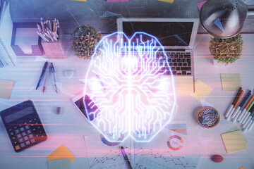 Multi exposure of brain sketch hologram over topview work table background with computer. Concept...