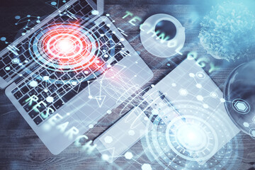 Multi exposure of data theme drawing hologram over topview work desk background with computer. Concept of technology.