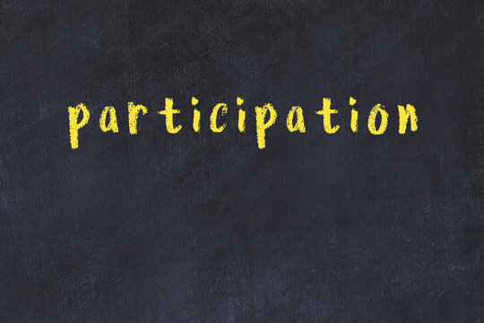 College chalk desk with the word participation written on in