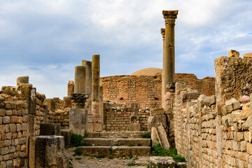 Multiple columns of Djemila, the archaeological zone of the well preserved Berber-Roman ruins in North Africa, Algeria. UNESCO World Heritage Site