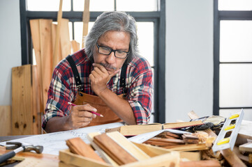 concept of wood DIY at home, carpenter working with wood