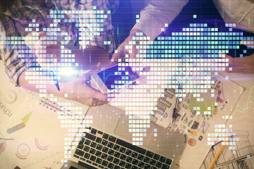 Obraz premium Double exposure of business theme drawing and man and woman working together holding and using a mobile device.