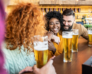 Group of friends talking to eachother and smiling