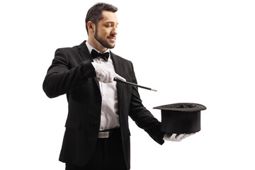 Magician performing a trick with a magic wand and a top hat